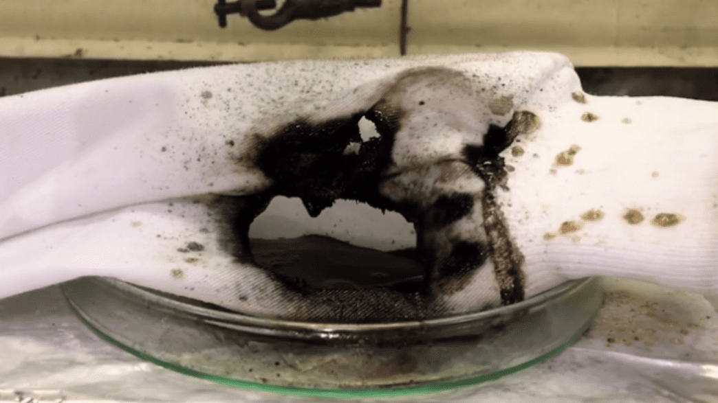 Watch What Happens If You Pour Chlorosulfonic Acid On A Lab Coat