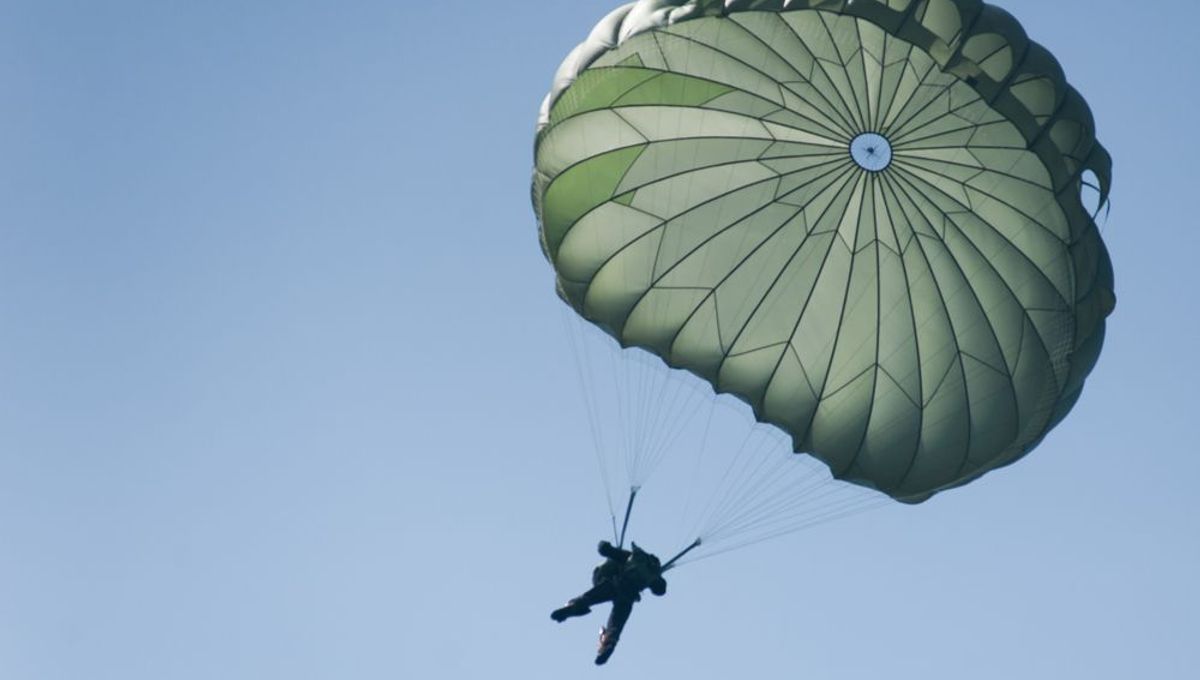 Soldier Survives 15,000Foot Fall And Crashes Through House After