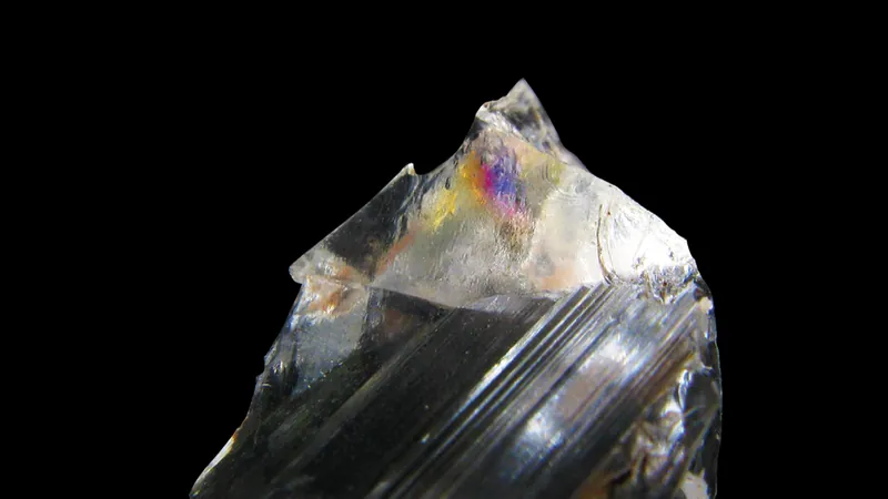 A specimen of rock crystal exhibiting the refractive qualities of a small internal structure within the crystal.