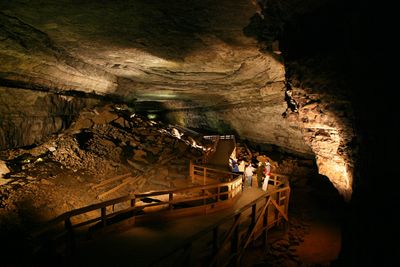 A huge underground dark cave is lit up with lights in Kentucky