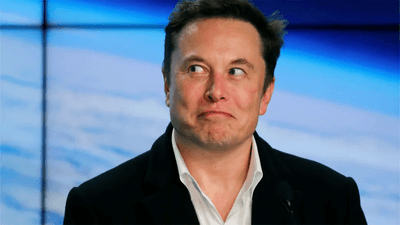 Elon Musk, in a suit.
