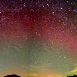 Two-photo composite capturing a Stable Aurora Red (SAR) Arc over Shenandoah National Park.