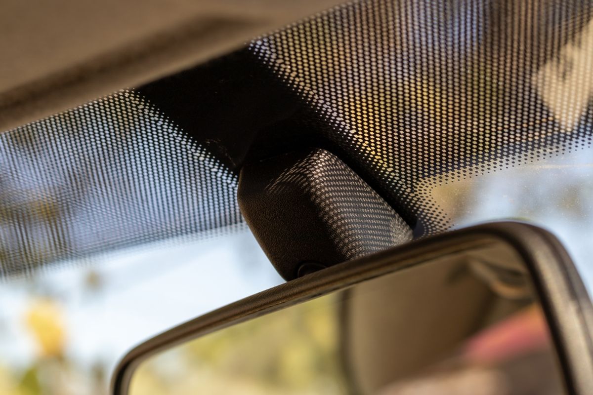 What Are All Those Black Dots On Your Car Windscreen For Anyway?