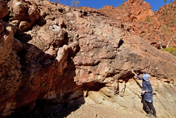 Evidence of the Sturtian Snowball Earth is found in rocks worldwide. Here Dr Adriana Dutkiewicz studies examples in the Flinders Range not far from the original discovery site