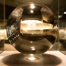 Photograph of one of the largest flawless quartz crystal balls in the world.