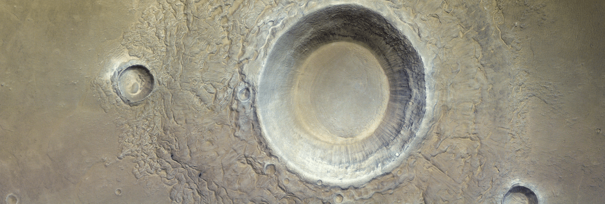 Gaze Into The Colossal Craters Of Mars And They Will Stare Icily Back