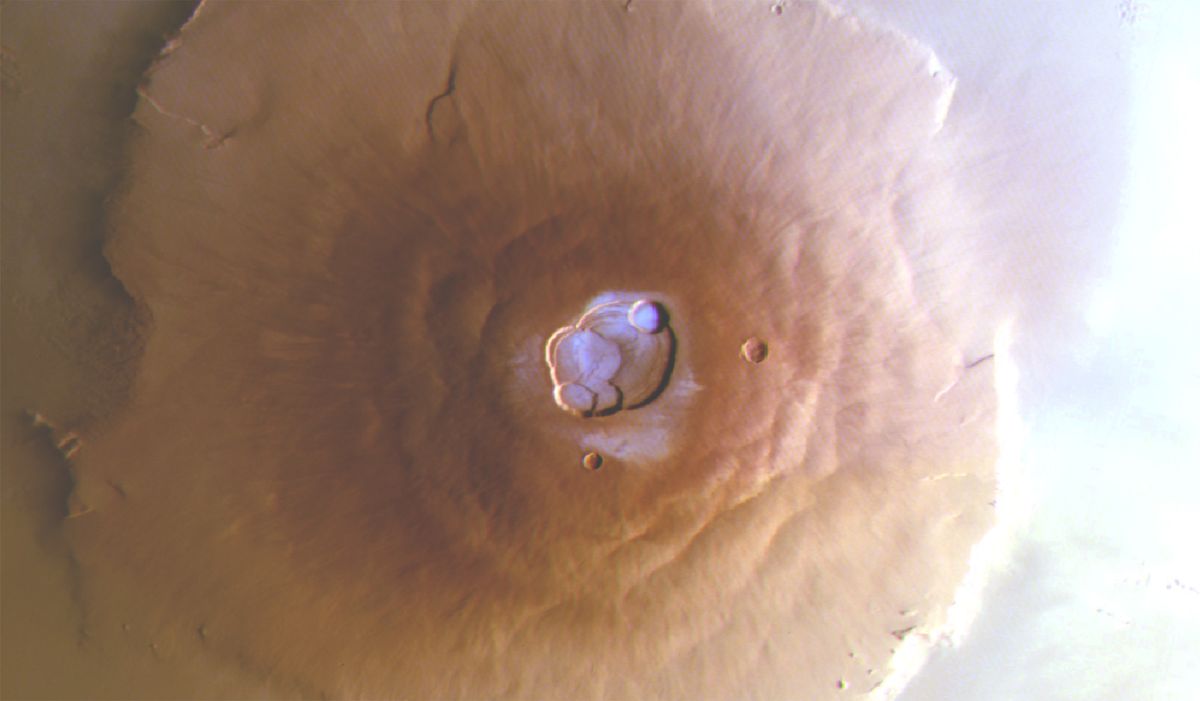 Water Ice Found Unexpectedly On Highest Volcanos In The Solar System