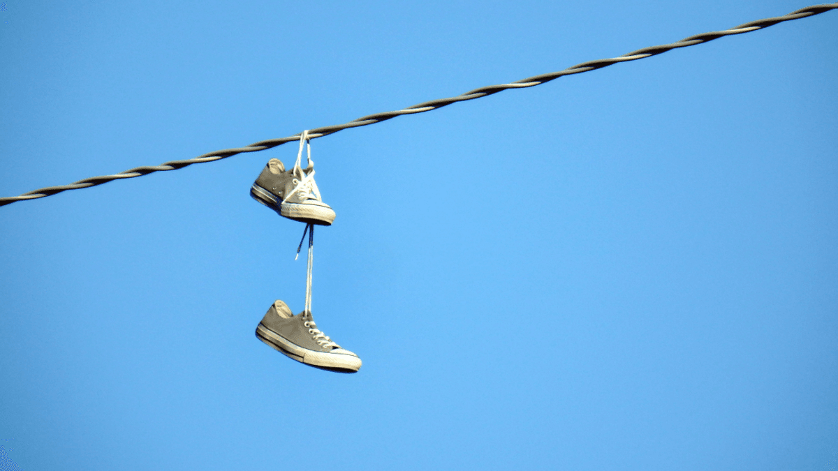Why Do You See So Many Shoes Wrapped Around Power Lines?