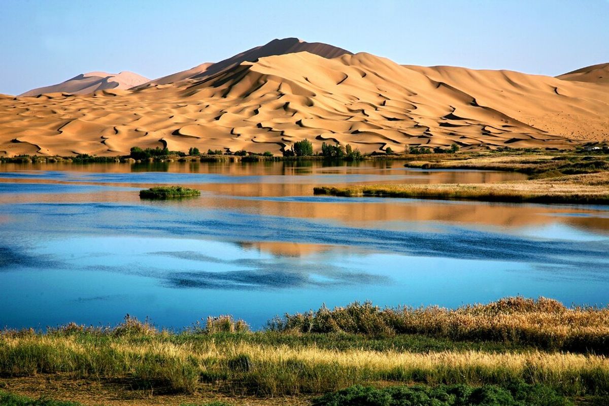 World’s Tallest Sand Dune, Caves With Early Human Tech Among UNESCO’s Newest World Heritage Sites