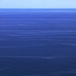 smooth patches of water out at sea where ocean slicks are