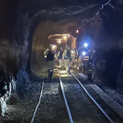 Almost 3 kilometers deep beneath the surface in a South African gold mine, researchers found live microbes that have been trapped in the rock for 1 billion years.