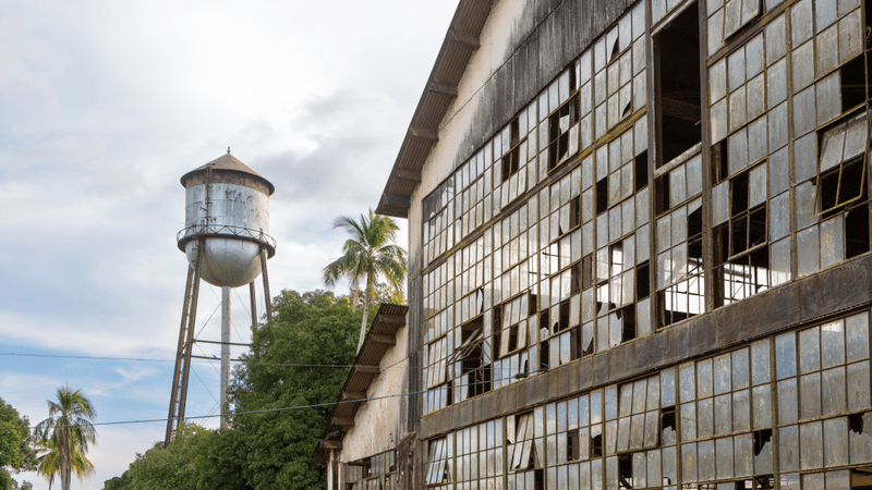 the water tower at forlandia next to the abandoned rubber factory
