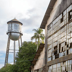 the water tower at forlandia next to the abandoned rubber factory