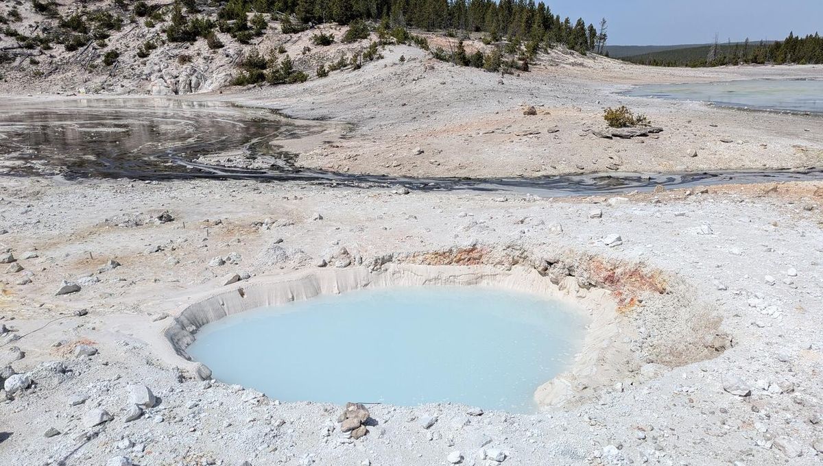 Satellite Images Reveal A Strange Hole Filled With Blue Liquid Emerging In Yellowstone National Park