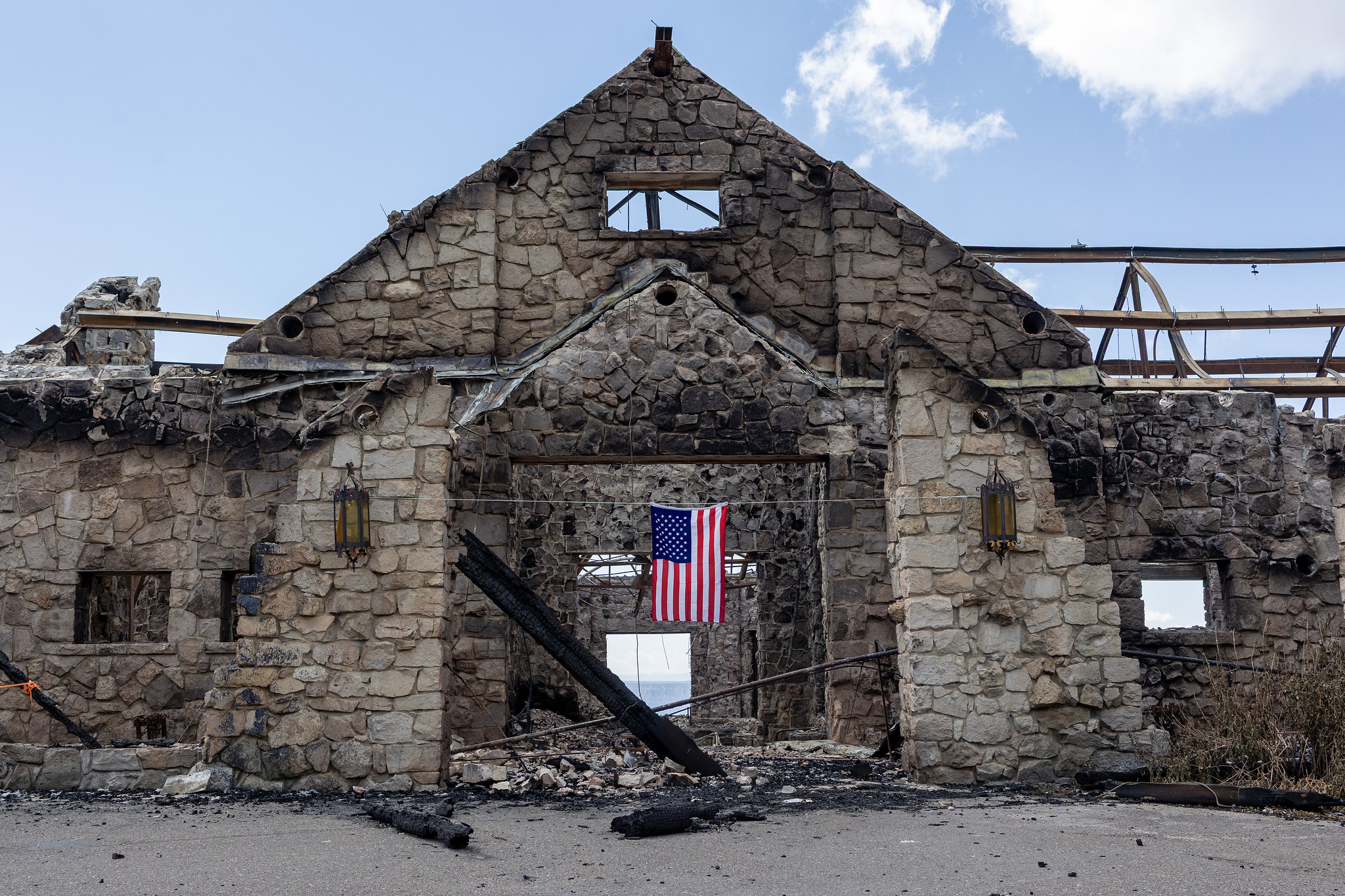 The front entrance to Grand Canyon Lodge as it appeared on July 18, 2025. The lodge was destroyed by the Dragon Bravo Fire July 12-13, 2025. NPS Photo/Matt Jenkins