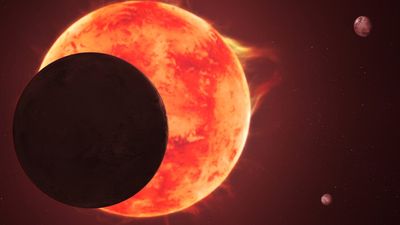 Artist impression of three planets around a small red dwarf, as seen from near one of the planets.