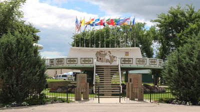 The UFO landing spot in St Paul, Alberta; a raised, circular platform decorated with flags and a map of Canada