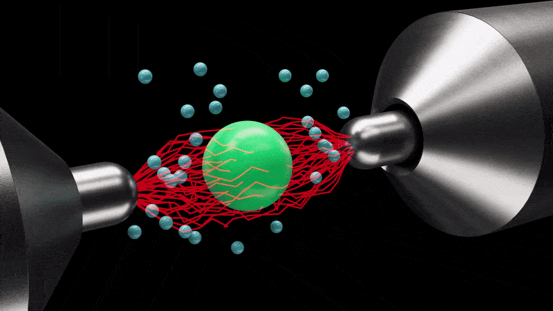 A green sphere is within red lines and vibrates slowly passing the energy onto blue spheres representing the air. When the lines become bigger and more chaotic, the sphere moves faster pushing more air around.
