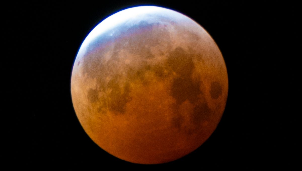 Lunar eclipse showing the moon turning red
