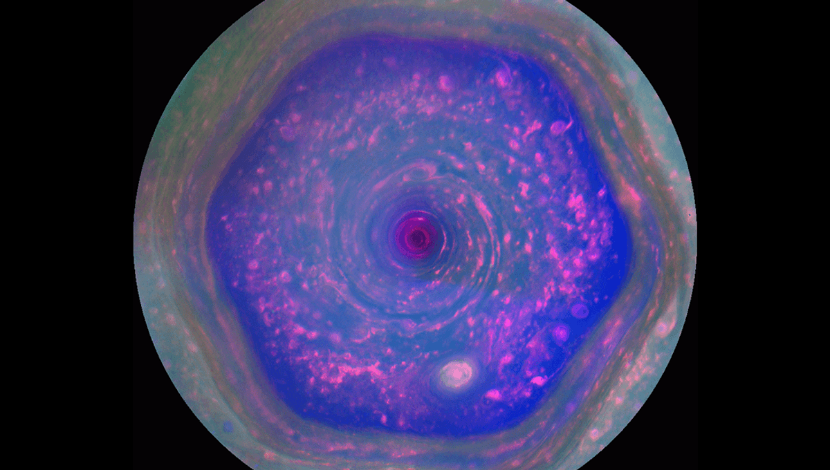 JWST Spots “Unexplained” Strange Dark Beads Above Swirling Hexagon Storm At Saturn’s North Pole