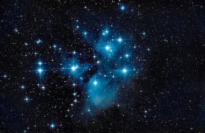 The Pleiades star cluster in blue showing off the "seven sisters"
