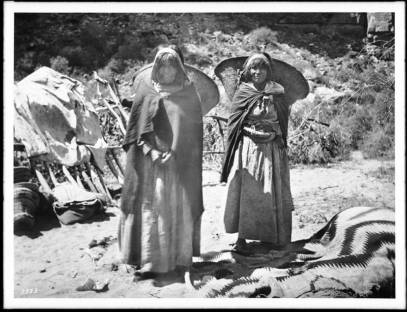 Two Havasupai women with "Kathaks" on their backs, ca.1900
