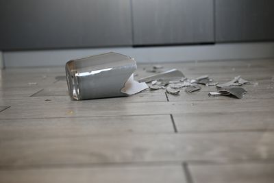 a broken vase on the floor