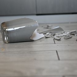 a broken vase on the floor