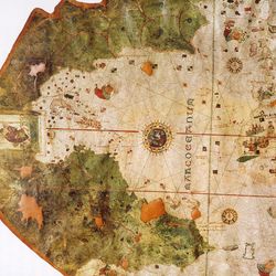 On Juan de la Cosa's 1500 world map, the Americas can be seen as a mysterious green landmass (left).