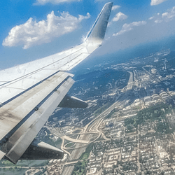 view from an airplane window during take off