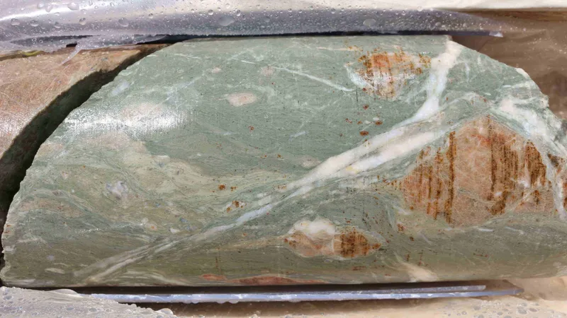 the rock core sample it's a very pretty duck-egg green color