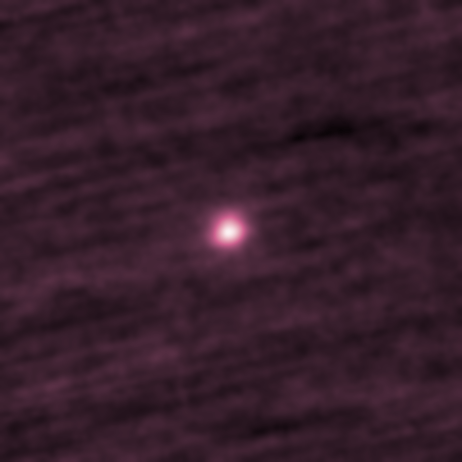 A fuzzy purple background with a glowing blob in the middle - that is 3I/ATLAS 