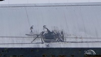 Damage at the Chernobyl New Safe Confinement structure from a drone strike on 14 February 2025.