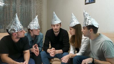 Idiot conspiracy theorists wearing tin foil hats