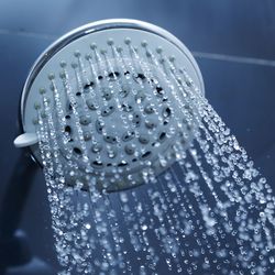 Shower head with cold water coming out.