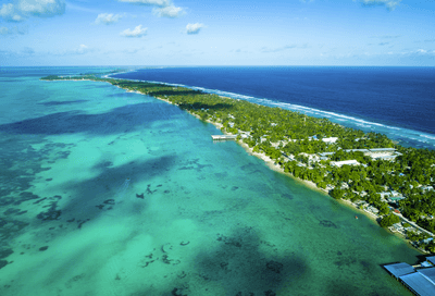 Kiribati in the Pacific Ocean, vast gree and blue seas.