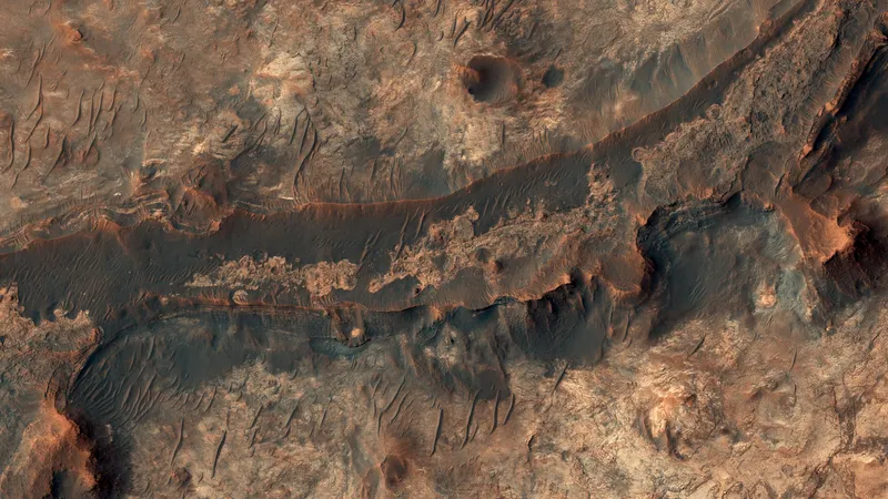 Billions of years ago, a river flowed across this scene in Mawrth Vallis.After Mars became a colder, drier place and the river disappeared, the rocky river bed remained.