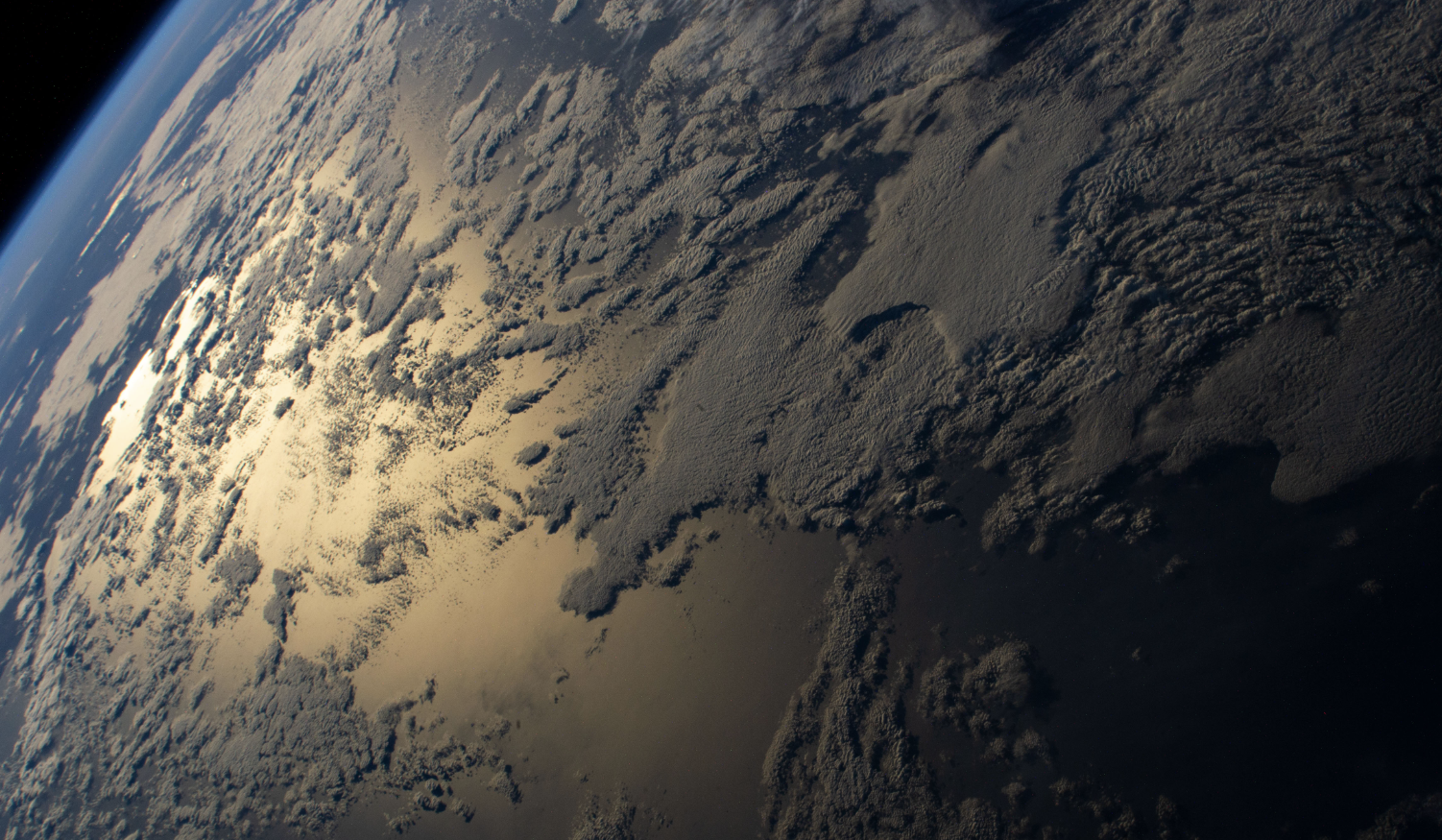 Sun glistening on Indian Ocean from the International Space Station in June 2021. Sun glistening on Indian Ocean from the International Space Station in June 2021.