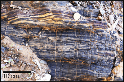 A banded iron formation deposited out of time, more than a billion years later than most, reveals the temperatures of the oceans at their coldest.