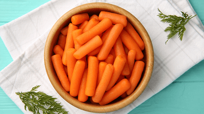 Baby carrots in a bowl.