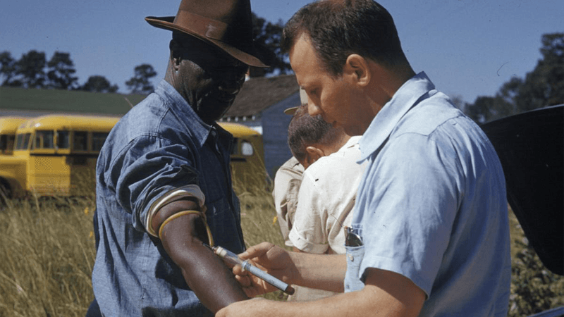 A participant in the Tuskegee Syphilis Study having his blood drawn.