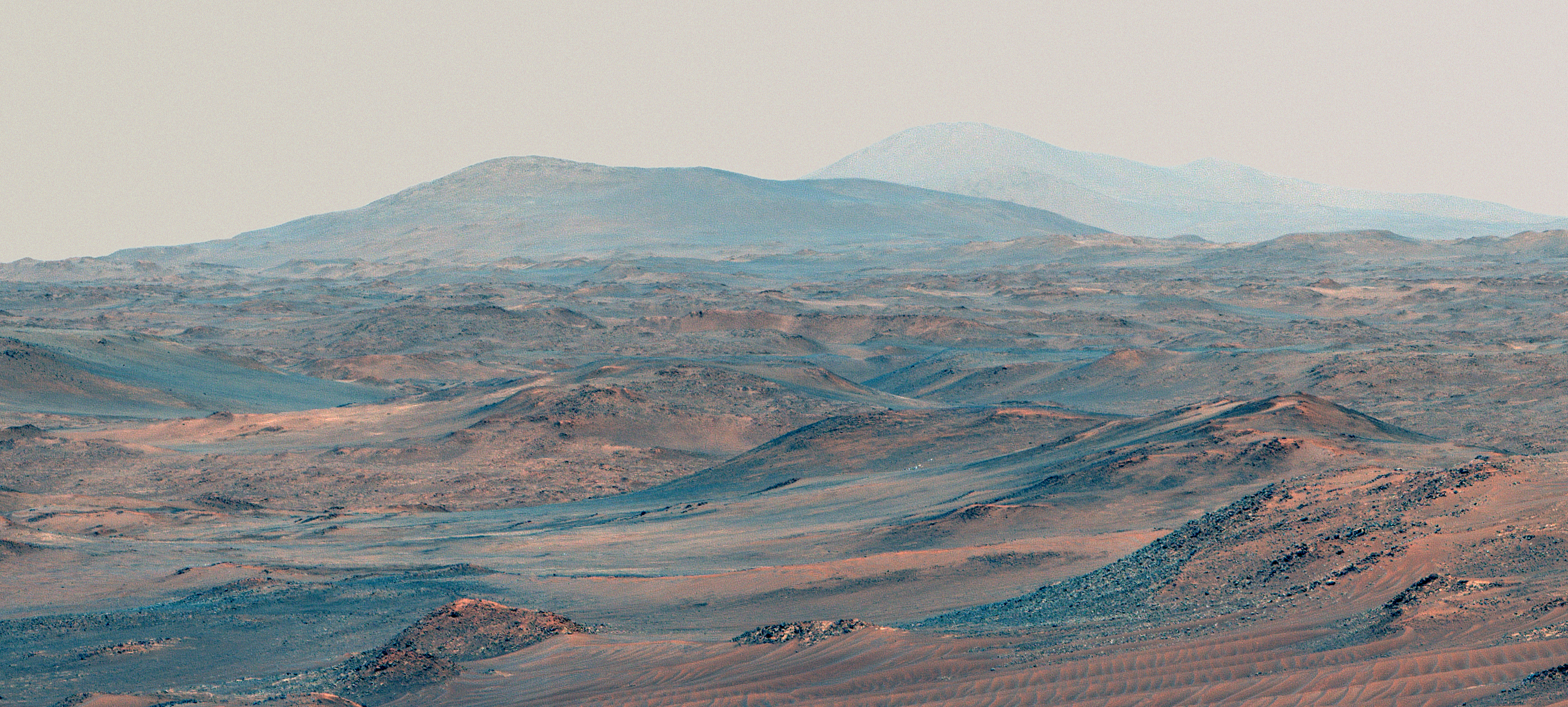 dunes and distant hills are visible in this image from Perseverance. dunes and distant hills are visible in this image from Perseverance.