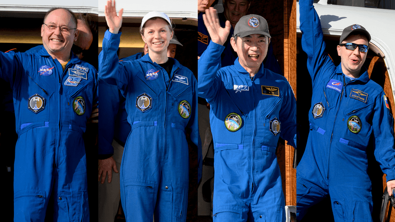 the four of them coming out of a plane, smiling and waving.
