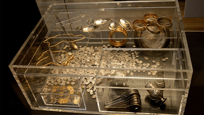Coins, spoons and bracelets; items of the Hoxne Hoard.
