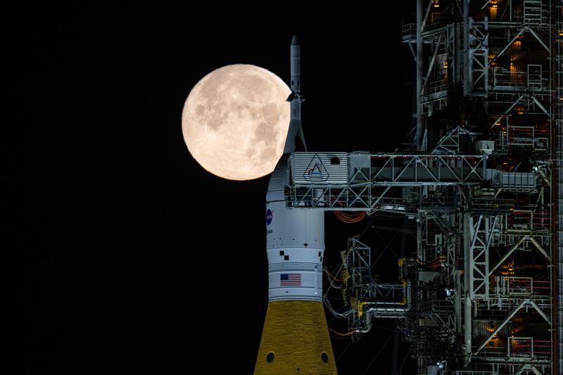 Artemis II's spacecraft with the Full Moon Behind it!