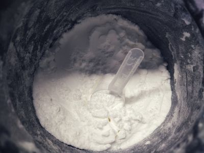 Pre-workout supplements with a scoop in.