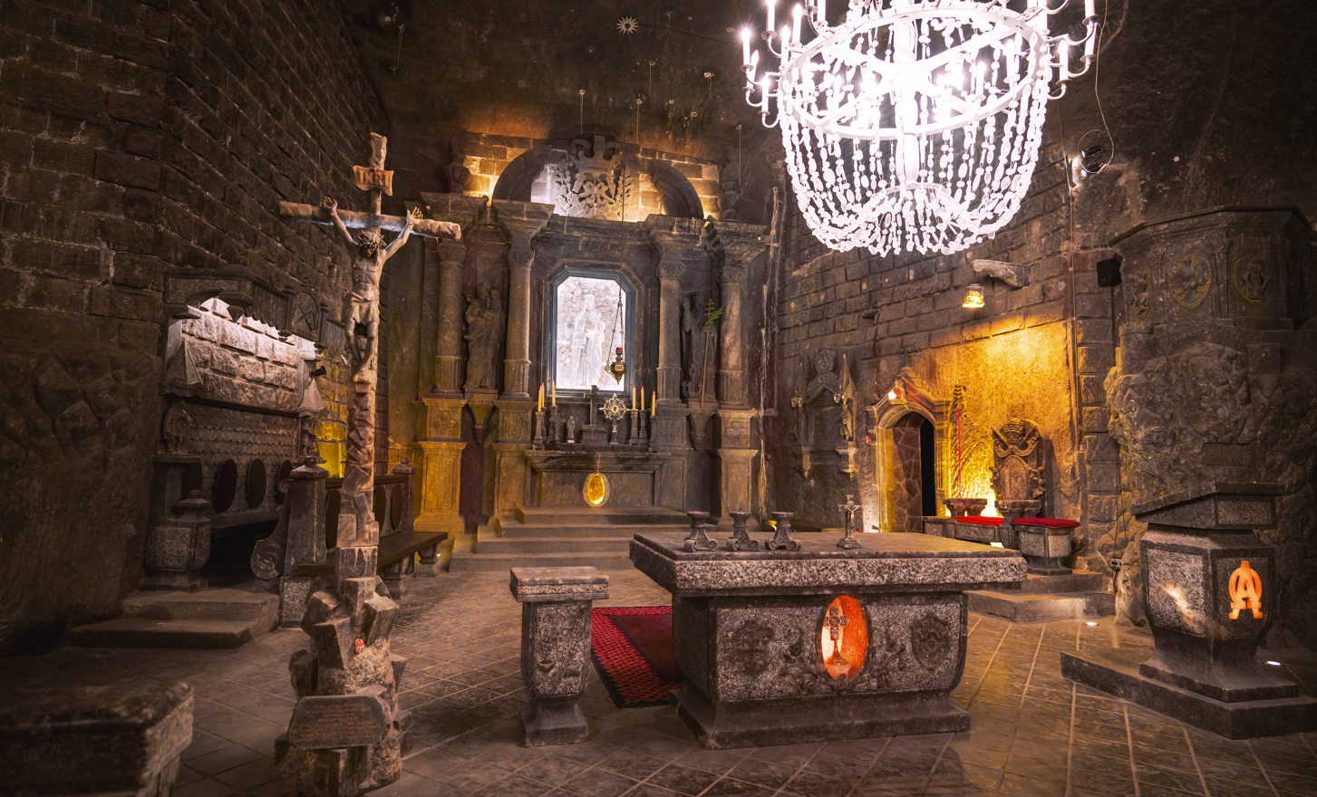 St. Kinga’s Chapel is found 101 meters (332 feet) underground in the salt mine. St. Kinga’s Chapel is found 101 meters (332 feet) underground in the salt mine.