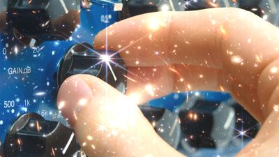 a hand adgiusting a dial overlayed with the JWST deep fields showing one bright stars and many galaxies.