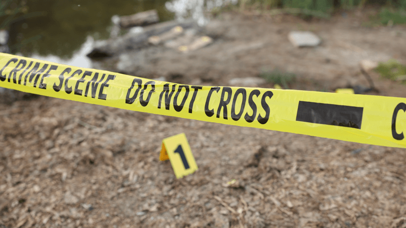crime scene do not cross tape over a crime scene