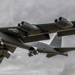 A huge B-52 bomber plane in the air 